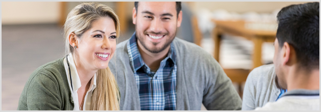 Photo of couple receiving financial counseling