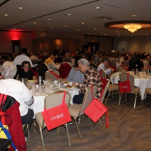 Rows of tables filled with Annual Meeting guests