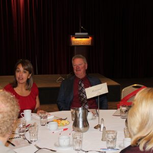 CEO with Board Members seated at round table