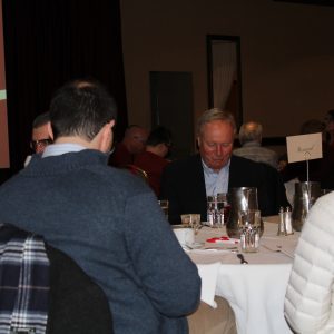 Congressman Joyce seated at table with other guests