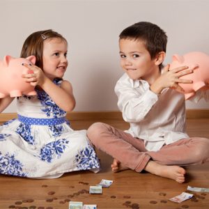 Children with Piggy Banks